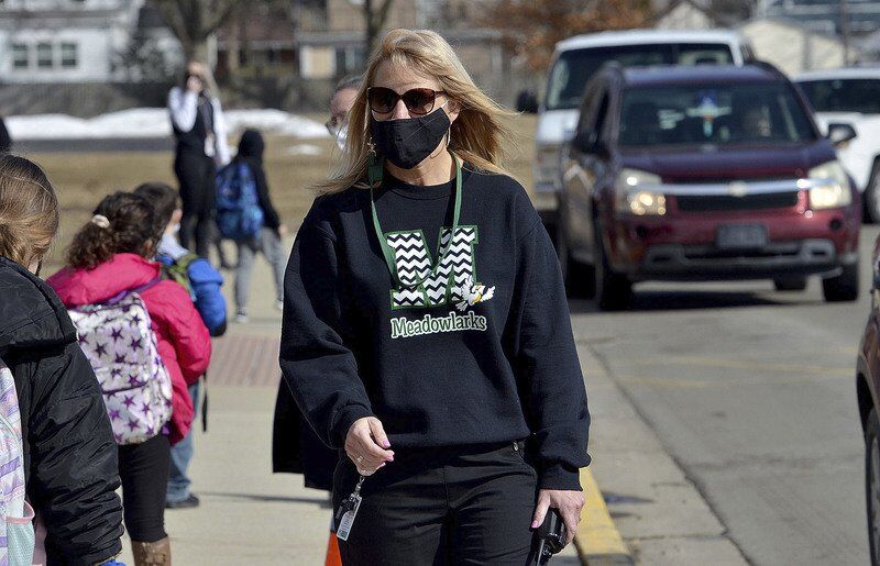 Teachers protest by wearing black